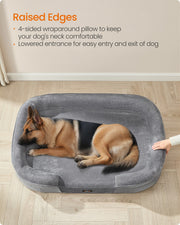 German Shepherd lying against the raised cushioned rim of the dog sofa bed