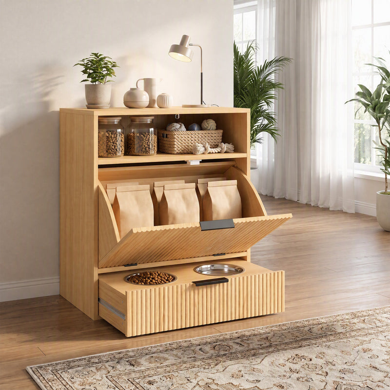 Feeding station in a living room with food bags in the open cabinet and bowls on the drawer