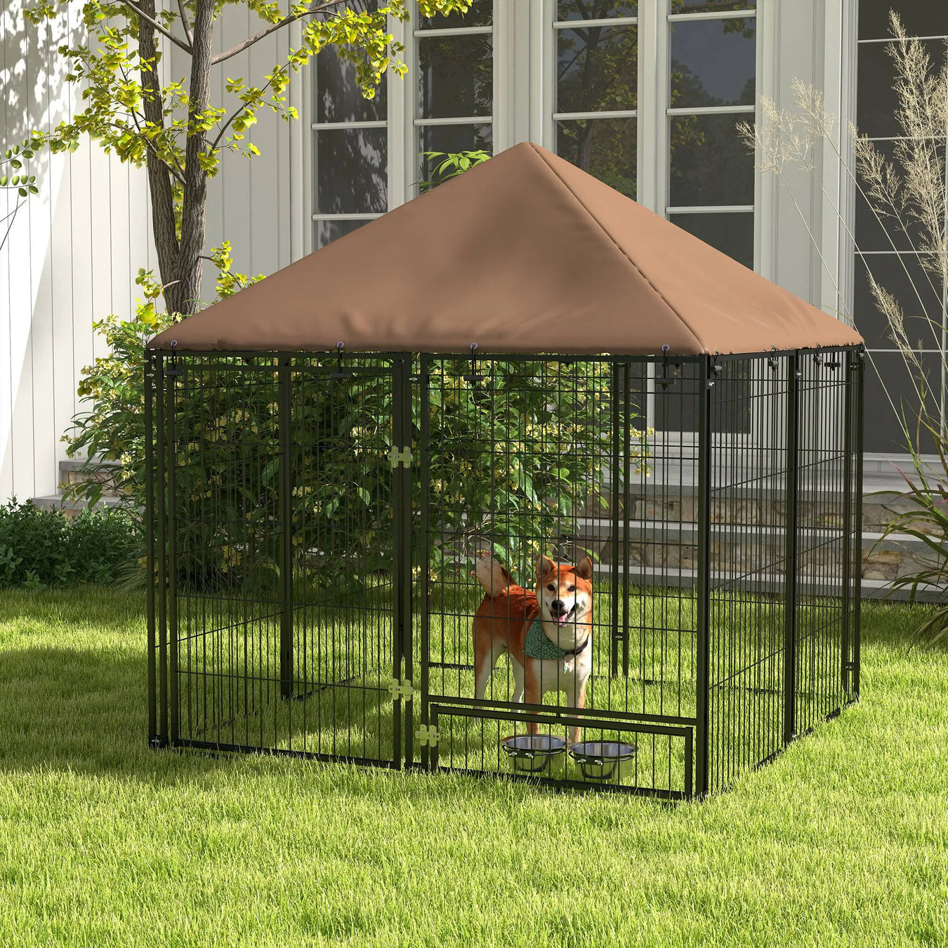 Dog in a large outdoor kennel with a brown cover on a grassy area.