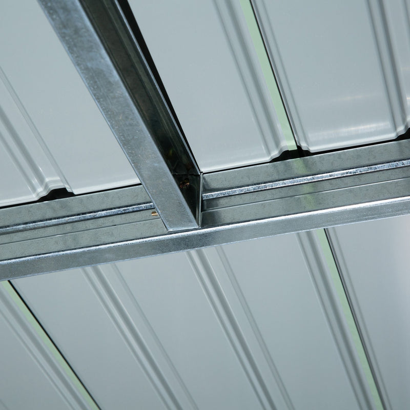 Close-up inside the shed of the galvanised steel roof beam and bolted bracket joint