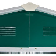 Close-up of the green gable end with the cream apex cap and two pressed louvre vents either side