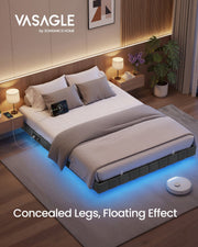 The bed frame in a panelled bedroom with blue LED underglow and a robot vacuum passing beneath