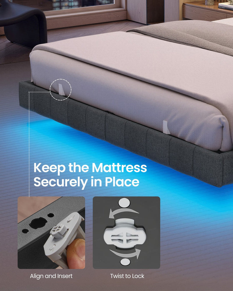 Close-up of a mattress retainer on the upholstered grey side rail above the blue underglow