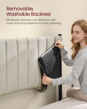 Woman peeling the beige fabric cover off the headboard to reveal the hook-and-loop backing underneath