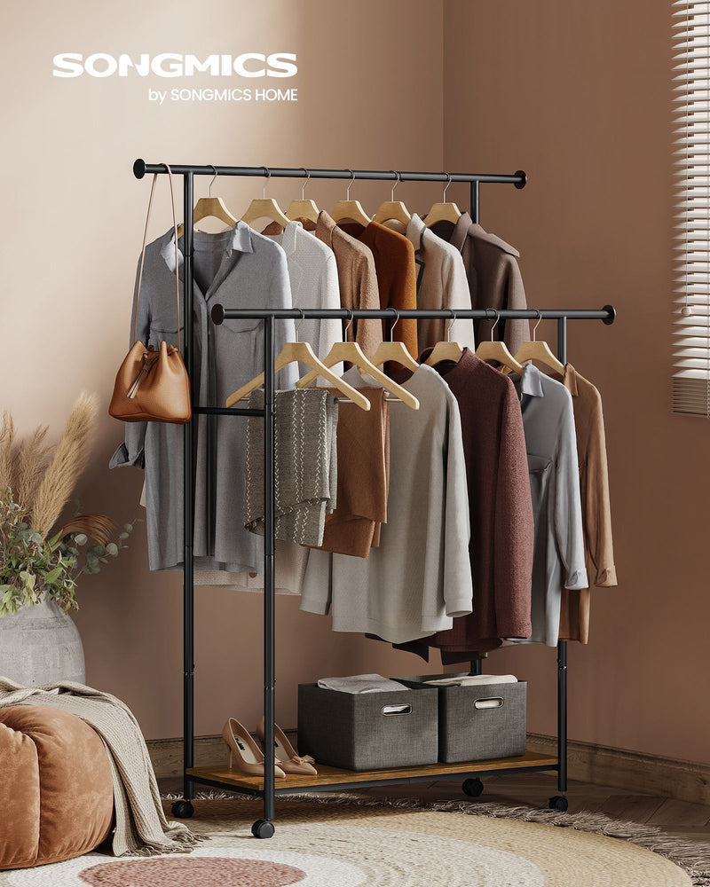 Songmics branded lifestyle photo of the clothes rack styled with hanging clothes, bags and shoe boxes