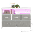 White dresser with 5 dove grey fabric drawers and a pink-lit LED display shelf