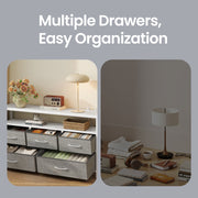 Open drawers showing folded clothes, books and magazines stored in the dresser