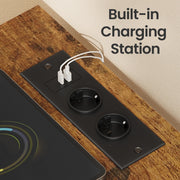 Close-up of the built-in charging station with two AC sockets and two USB ports