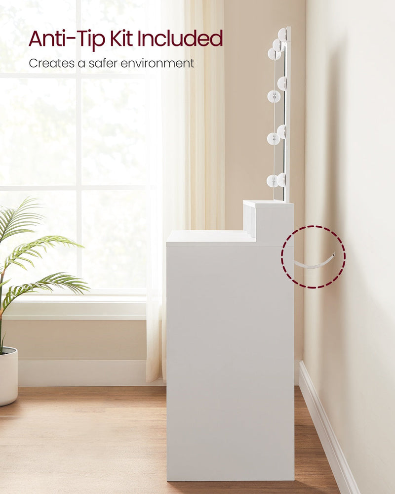 Close-up of the anti-tip wall-anchor kit fitted to the back of the dressing table