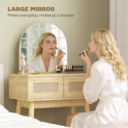 Woman applying makeup at the dressing table's arched mirror