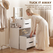 Woman sliding the padded stool under the 60 cm wide vanity