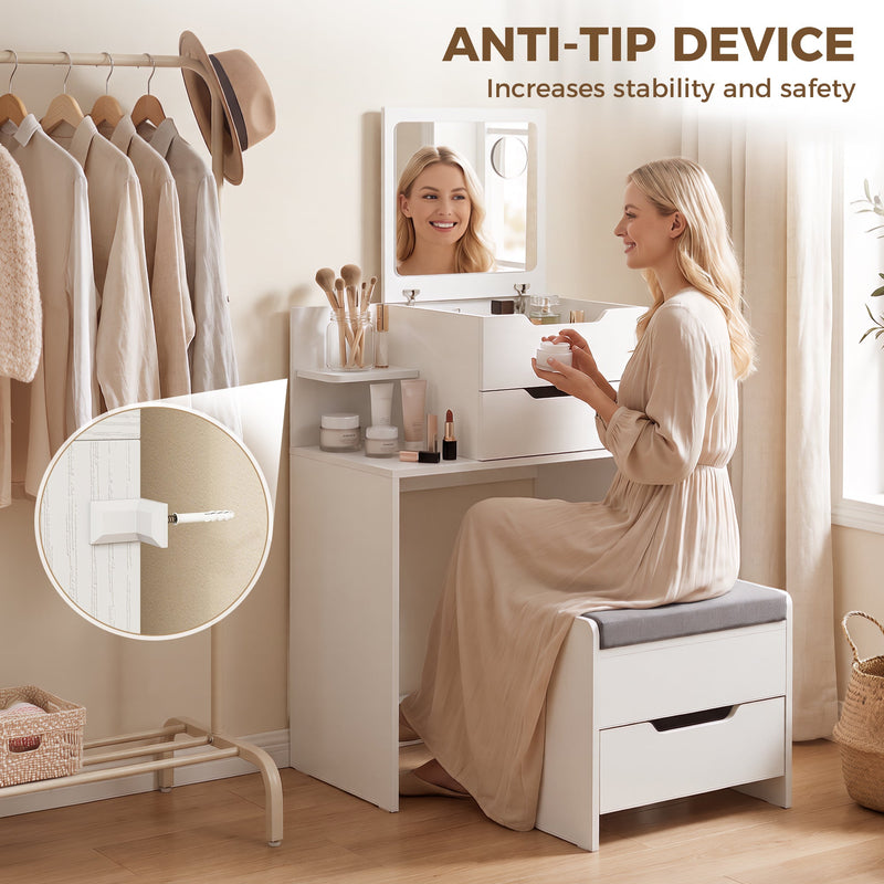 Woman seated at the vanity with a close-up of the anti-tip device