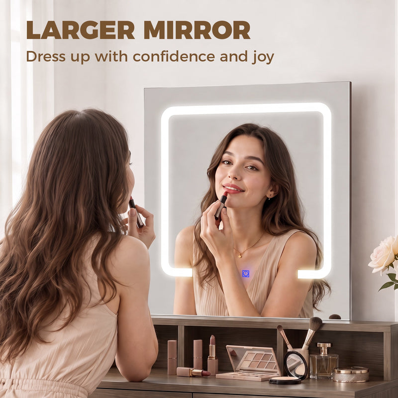 Woman applying lipstick using the dressing table's LED mirror