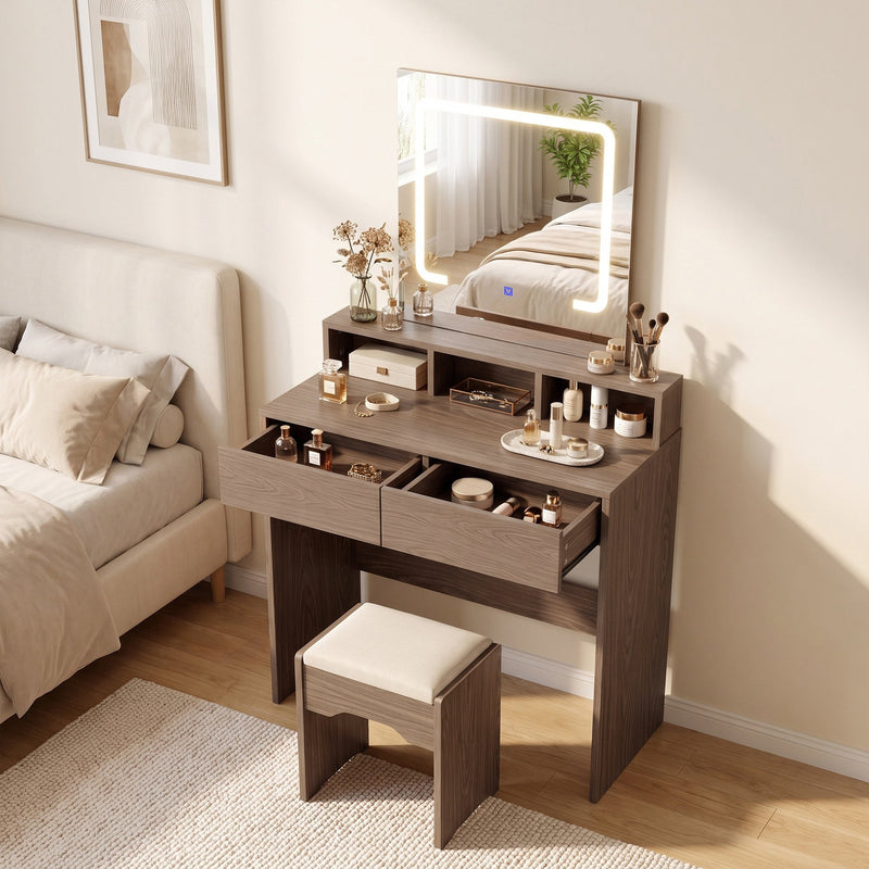 Dressing table styled in a bedroom with a stool and bed in the background