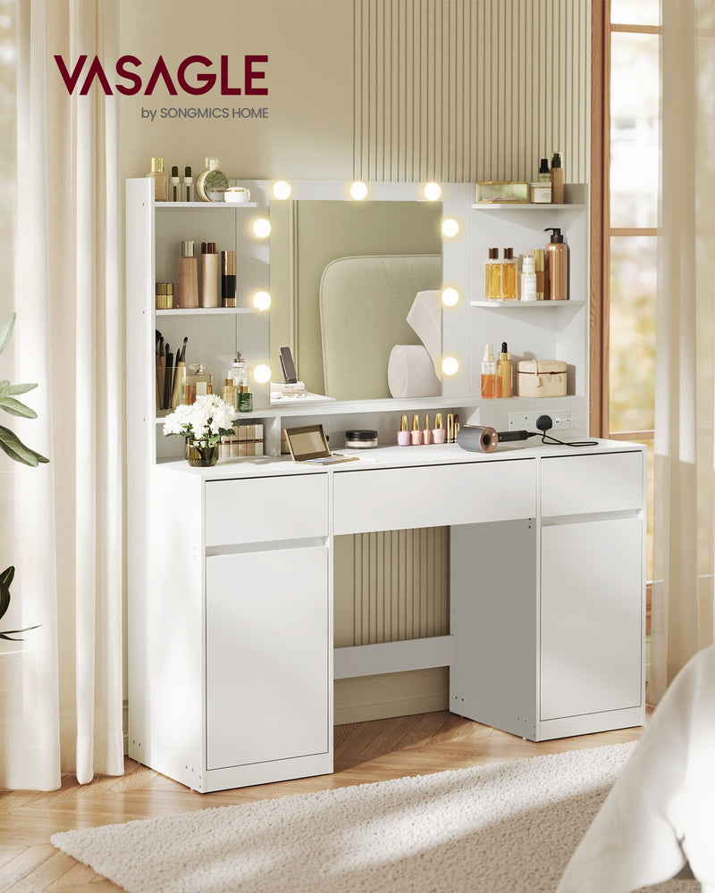 White LED dressing table styled with skincare bottles and a hair tool in a sunlit bedroom