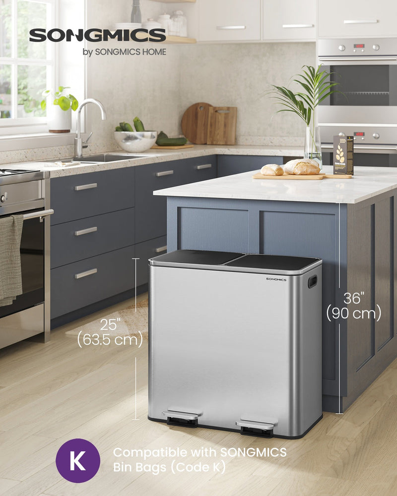 Silver dual compartment pedal bin standing 63.5 cm tall beside a kitchen island in a modern kitchen