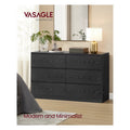 Ebony Black 6 drawer dresser with a mirror, lamp and plant on top in a bedroom corner