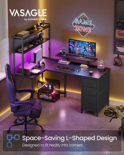 L-shaped gaming desk with purple LED lighting in a gaming room corner