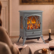 Stove heater glowing in a warm lounge beside a candle and glass of wine