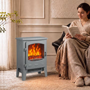 Grey electric fireplace heater beside an armchair in a cosy living room