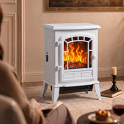 White electric fireplace stove lit in a living room beside a candle and coffee table, viewed from an angle