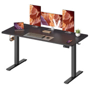 Studio view of the 140 x 60 cm electric standing desk with three monitors and a laptop
