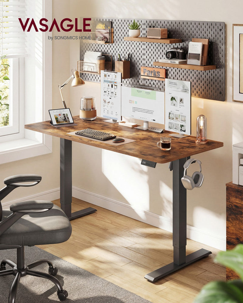 Home office corner with shelves above the standing desk and dual monitors