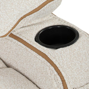 Close-up of a black cup holder set into the beige armrest