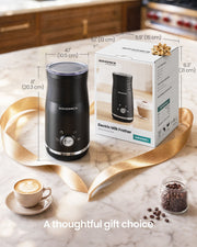 Milk frother wrapped with a gold ribbon next to its gift box, marked 20.3 cm tall and 10.5 cm wide