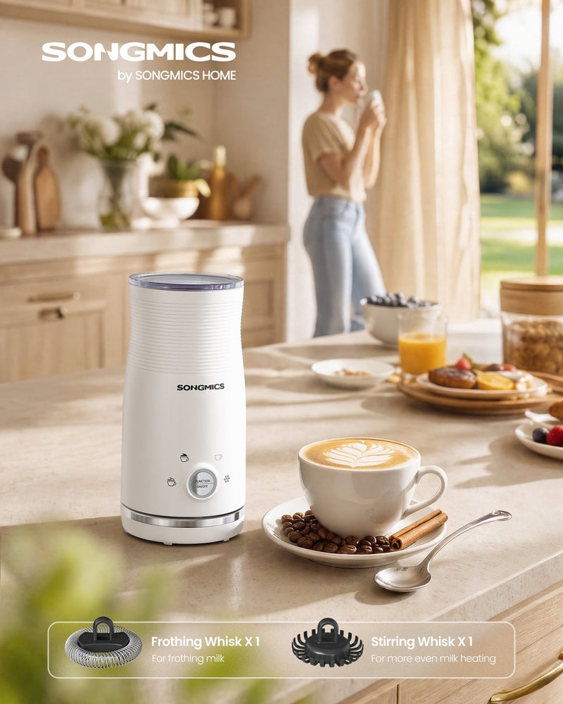Frother on a sunlit kitchen worktop beside a latte and breakfast, with a woman drinking coffee in the background
