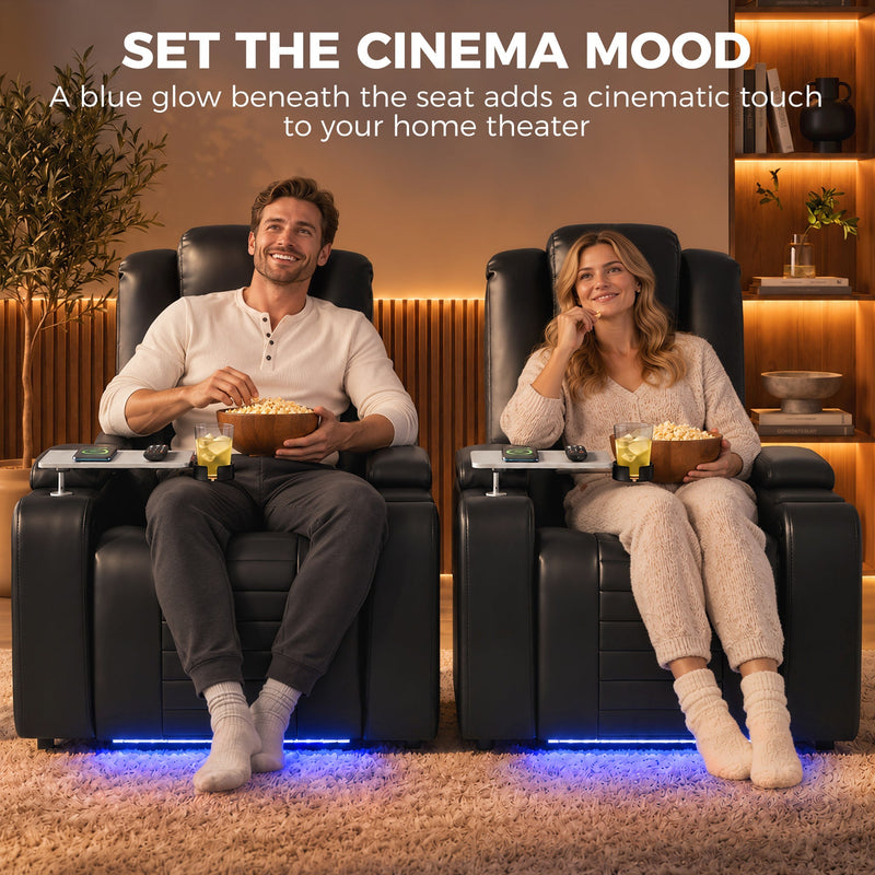 Two black electric recliners side by side with blue LED glow in a home cinema setting