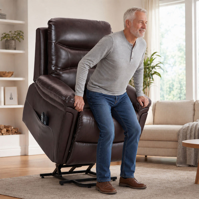 Man standing up from the riser recliner chair as the power lift raises the seat