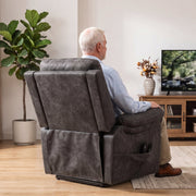 Man seated in the riser recliner watching TV in a living room
