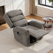 Dark grey recliner fully reclined with footrest raised in a living room