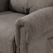 Close-up of the dark grey velvet-feel fabric texture on the recliner's armrest