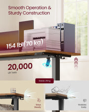 Close-up of the desktop under a 70 kg load with a graphic showing 20,000 motor lift tests and stable lifting