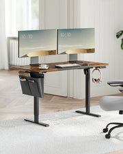 Rustic brown standing desk in a home office beside a chair on a light rug