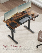 Two-tone rustic brown and black tabletop with dual monitors on a standing desk