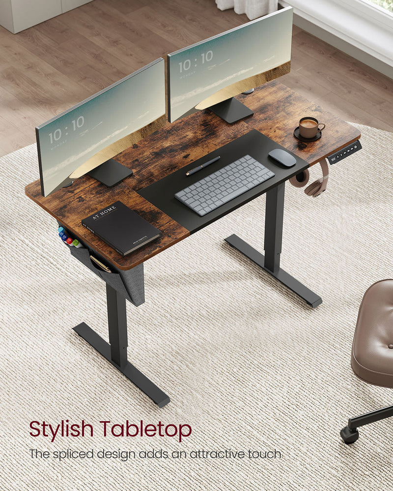Two-tone rustic brown and black tabletop with dual monitors on a standing desk