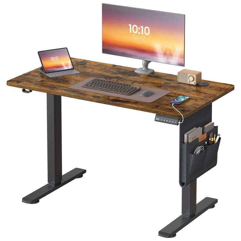 Rustic brown desktop on a black metal frame with a monitor, tablet and side storage pocket