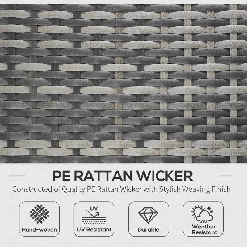 Image of an ergonomic curved rattan sun lounger with dark grey cushion