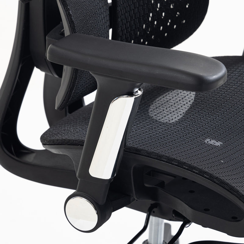 Close-up of a black armrest and mesh seat on a white background