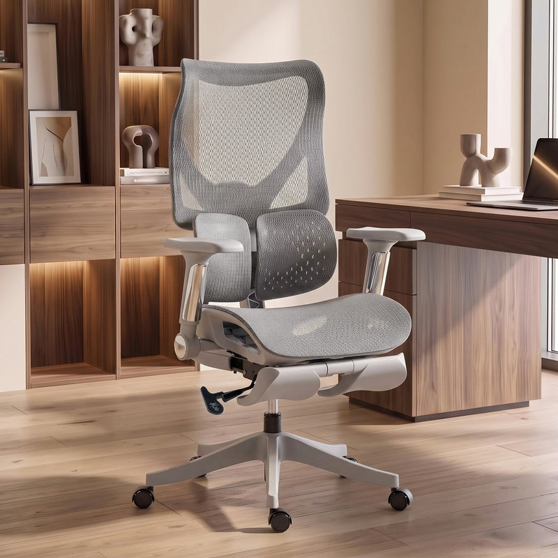 Grey ergonomic mesh office chair beside wooden shelving in a home office