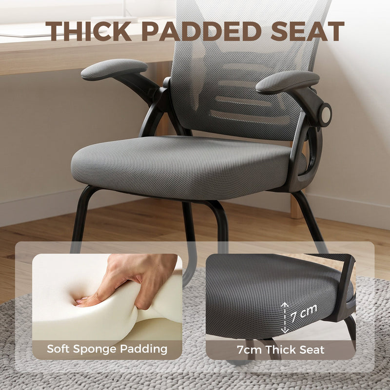 Close-up of the Dark Grey chair's padded seat and mesh backrest fabric