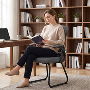Detail of the powder-coated steel leg and floor glide on the Dark Grey chair
