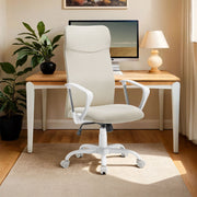 Cappuccino beige ergonomic office chair in a home office beside a wooden desk