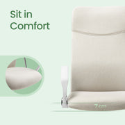 Side view of the office chair showing the S-shaped backrest and tilt mechanism