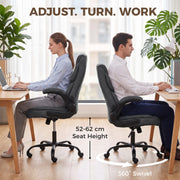 Two people seated at desks in dark grey chairs showing the 52-62 cm seat height and 360 degree swivel