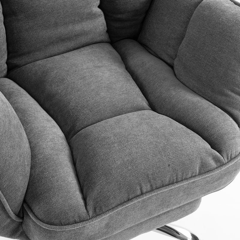 Close-up of the dark grey padded seat cushion and armrest