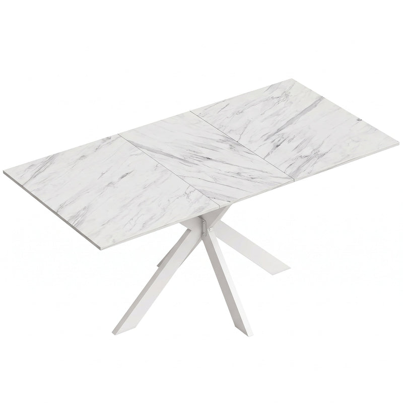 White marble effect extendable dining table with white steel cross legs on a plain background